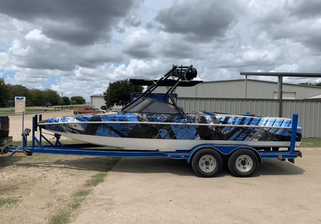 Full vehicle wrap on a wakeboard boat by 1st Class Graphics in Mansfield, TX